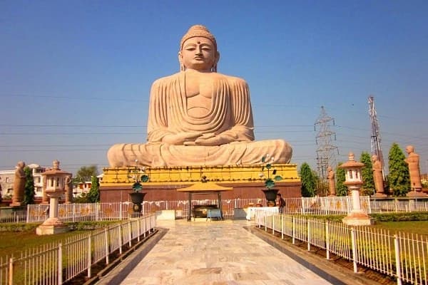 The Great Buddha statue in Bodh Gaya, Bihar, seated in dhyana mudra above a wide marble approach